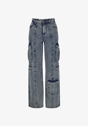 Denim cargo pants in light blue. Features wide legs, multiple side pockets, and contrasting dark denim accents. Structured with visible seams.
