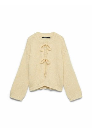 Cardigan en tricot couleur crème avec manches longues et deux liens à l'avant, présentant une coupe légèrement raccourcie et un col rond.