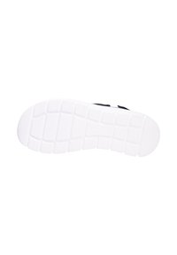 Semelle en caoutchouc blanche d'une chaussure présentant un motif de grille texturé et des bords arrondis, indiquant flexibilité et traction.