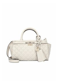 Kleine beige gewatteerde handtas met een glanzende afwerking, bovenhandvatten, afneembare riem, gouden beslag en een hartvormige hanger.