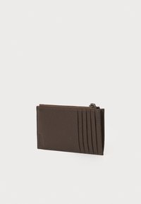 Brown leather wallet featuring a textured finish, with multiple card slots on one side and a zippered compartment for coins.