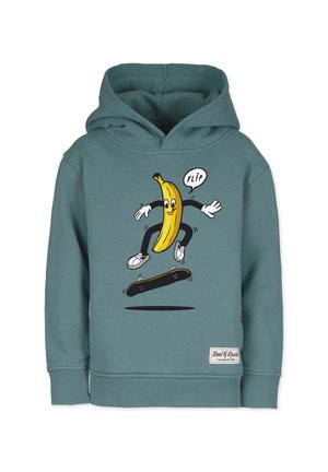 Turkooise hoodie met cartoon banaanfiguur die een skateboardtruc uitvoert, met sneakers en handschoenen aan, en een spreekballon met de tekst "FLiP."
