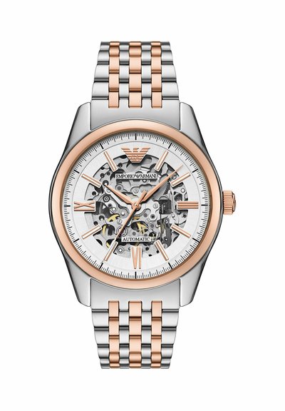 Zweifarbige silberne und roségoldene Automatikuhr mit Skelettzifferblatt, das die inneren Zahnräder zeigt, roségoldene Stundenmarkierungen und Emporio Armani-Logo bei 12 Uhr.
