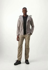 Houdini THE ORANGE JACKET - Hardshell bunda - sandstorm