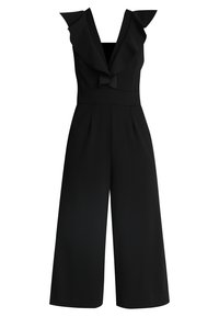 Svart jumpsuit med volangdetalj på axlarna, vid byxdesign och figursydd midja. Tillverkad av mjukt tyg, med rena linjer och veck.