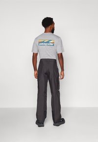 Patagonia INSULATED POWDER TOWN PANTS - Nohavice na snowboard - black