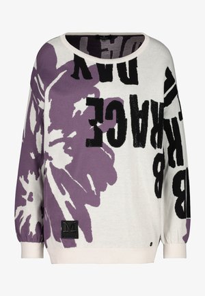 Hvid og lilla langærmet sweater med stort abstrakt blomsterprint og fed sort tekst i forskellige retninger.