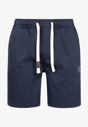 Marineblauwe zwembroek met elastische tailleband en witte trekkoord. Inclusief zijzakken en een klein logodetail op het onderbeen.