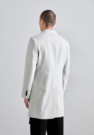 Rankning 13: Tiger of Sweden - FINNAN - Klassisk kappa / rock