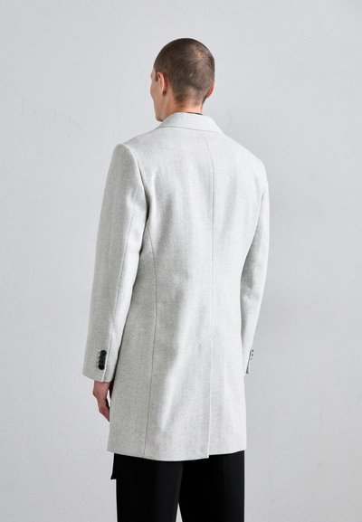 Light grey tailored coat featuring a straight cut, notched collar, and single-button cuffs. Textured fabric with a smooth finish.