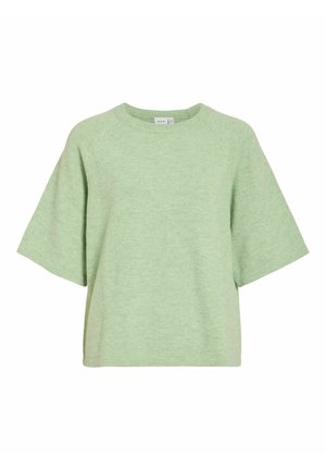 Heleroheline üle mõõtme lühikeste varrukatega kampsun, millel on ümmargune kaelus ja pehme, tekstuuriga kangas. Omadustega raglaanvarrukad ja lühike lõige.