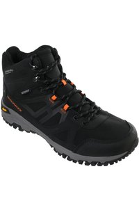 Stivale da hiking nero con tomaia in softshell impermeabile, accenti arancioni e suola in gomma robusta dotata di scanalature profonde per una migliore aderenza.