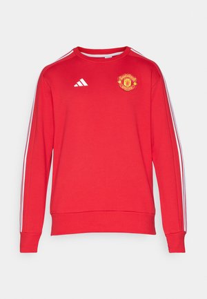 Rød hettegenser med rund hals, lange ermer, hvite Adidas-striper på skuldrene og Manchester United-logo på brystet.