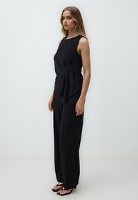 Jimmy Key Stoffhose - black