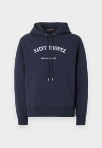 Sweat à capuche bleu marine avec poche kangourou devant, cordons et texte blanc "Saint Tropez" et "Michael Kors" sur le devant.