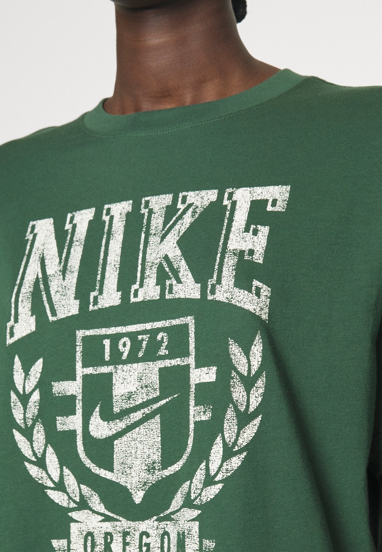 green and black nike t shirt