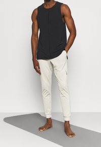 Nike Performance Träningsbyxor - beige