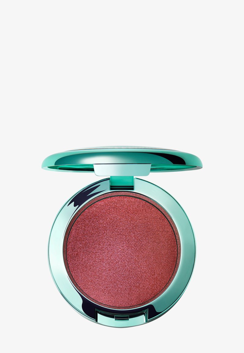 Blush compatto con una custodia teal lucida, dotato di una polvere rosee brillante e rotonda. Si apre con un cerniera per un facile accesso.
