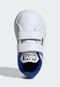 White leather sneaker with blue fabric interior, featuring two hook-and-loop straps and a black Marvel logo on the tongue. Rounded toe design.
