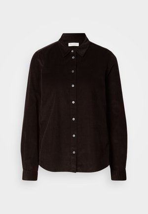 Camicia in corduroy marrone scuro a maniche lunghe con colletto e chiusura frontale con bottoni, esposta piatta su uno sfondo chiaro.