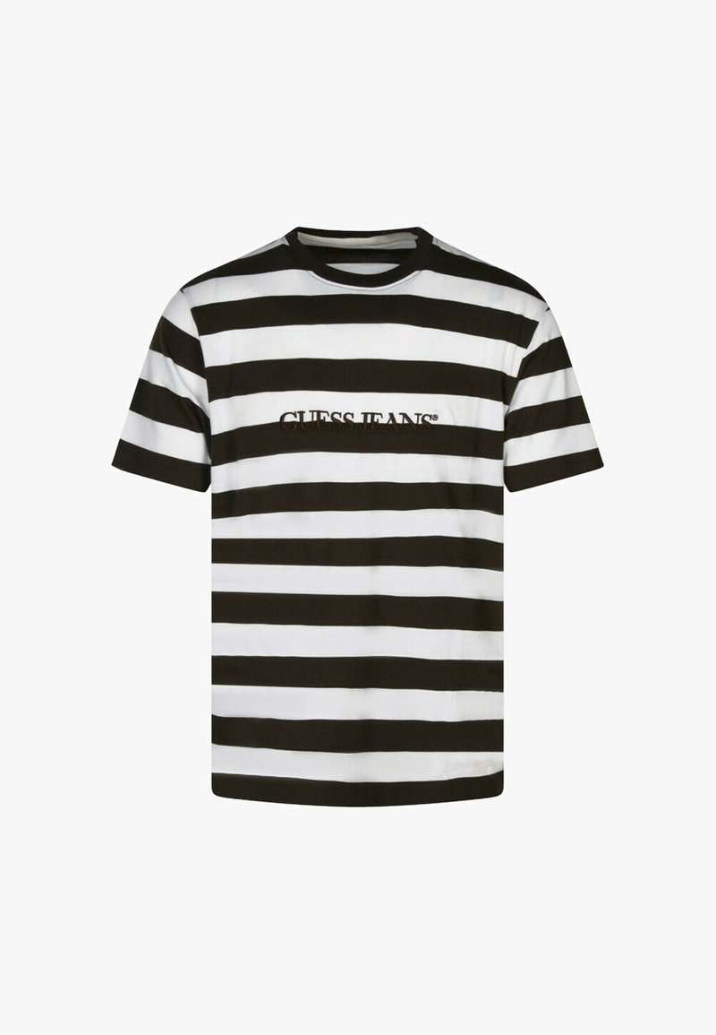 T-shirt à rayures noires et blanches, manches courtes, col rond, avec le logo "GUESS JEANS" en couture marron sur le devant.
