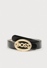 Μαύρη δερμάτινη ζώνη με χρυσή οβάλ αγκράφα που φέρει ανάγλυφο το λογότυπο "BOSS". Λείο υλικό με κλασικό σχεδιασμό και ρυθμιζόμενο μήκος.