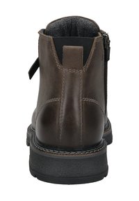 Brązowy skórzany botek za kostkę o gładkim wykończeniu, z elastycznym bocznym panelem i teksturowaną gumową podeszwą. Posiada zamek błyskawiczny i uchwyt do zakładania.