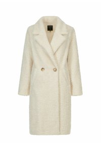 Cappotto beige, doppiopetto, realizzato in tessuto morbido con ampi rever, tasche laterali e grandi bottoni in legno.