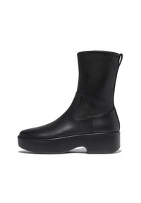 Zwarte leren enkellaarzen met een gladde textuur, ronde neus en een dikke platformzool. Beschikt over een zijkant met rekpaneel en een lus aan de achterzijde.