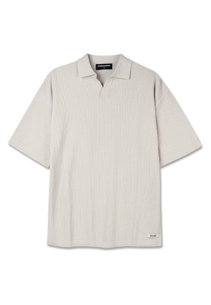 Light gray short-sleeve polo shirt with ribbed texture, V-neck, and subtle branding label at the hem. Features a relaxed fit.