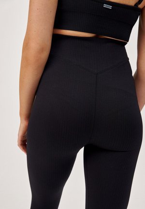 SNOCKS, UMSTANDSLEGGINGS SEAMLESS - Leggings - schwarz
