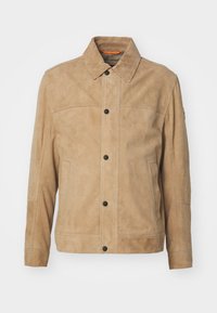Seleccionado, open brown