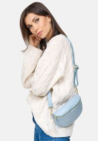 Harpa Heuptas - light blue