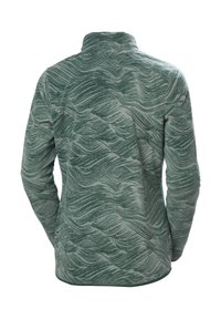 Pull en polaire vert avec des motifs en vagues. Il dispose d'un col montant et de manches longues. Tissu texturé avec une apparence douce et brossée.