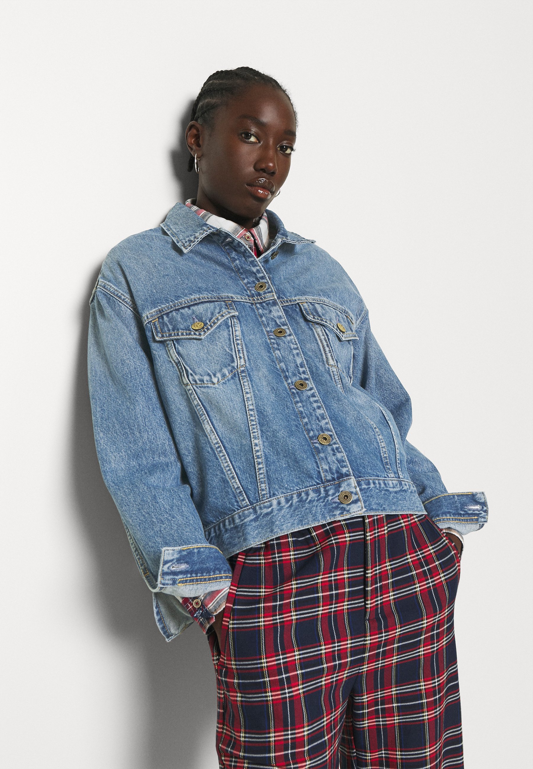 plaid pants and denim jacket