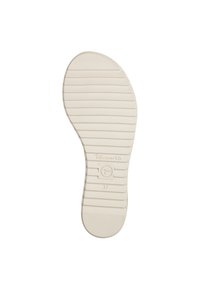 Semelle de chaussure en caoutchouc blanc avec des rainures horizontales pour une meilleure adhérence et un embout arrondi. Marquée "37" et portant un logo.