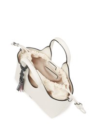 White leather handbag with black trim, has a soft, gathered interior lining and a detachable keychain with hardware accents. Features dual handles.