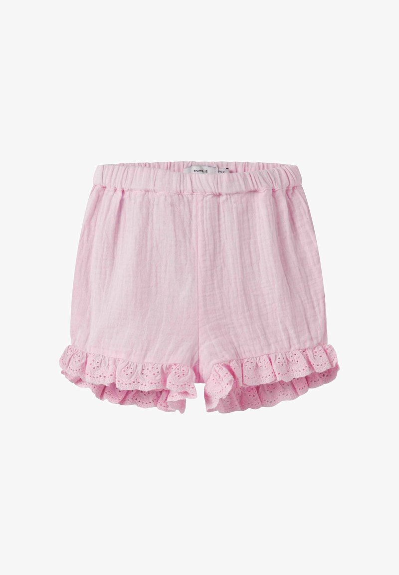 Vaaleanpunaiset puuvillahousut, joissa on pehmeä rakenne, rypytetty helma, joka on koristeltu reikälaskoksella. Joustava vyötärö helpottaa istuvuutta.