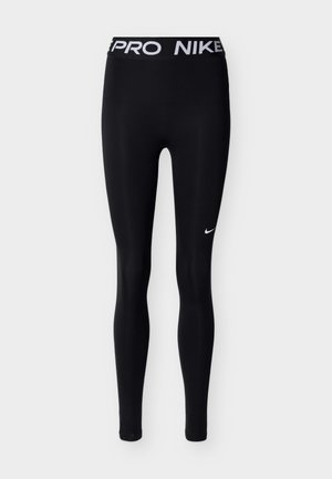 Leggings deportivos negros con una cinturilla gruesa que lleva las palabras "PRO" y "NIKE" en letras blancas. Incluye un pequeño logo blanco de Nike en la pierna.