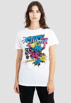 White cotton t-shirt featuring a colorful graphic of a blue alien character with large ears, accompanied by bold text and accents in pink and yellow.