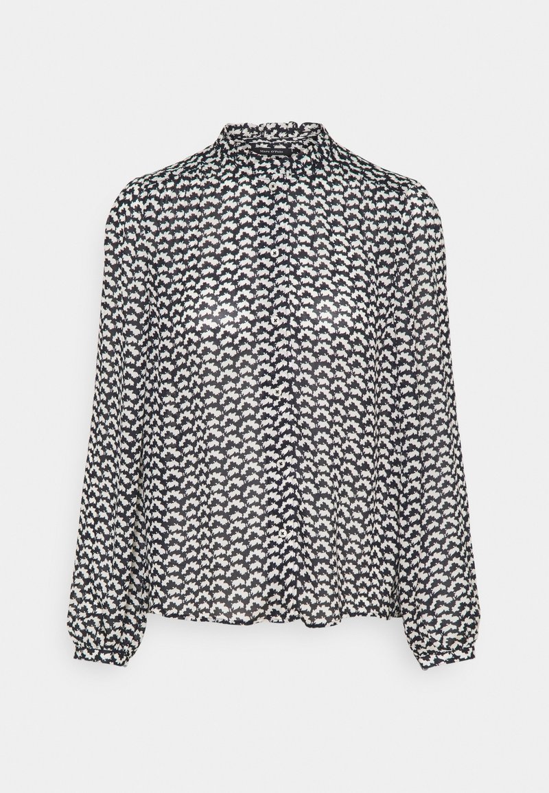 Blouse à manches longues à motif noir et blanc avec patte de boutonnage devant, poignets froncés et léger détail de volant au col.