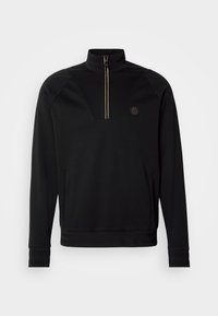 Pull noir à manches longues avec col montant, demi-zip devant finition métallique, logo discret sur la poitrine et deux poches avant.