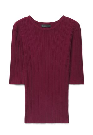 Top in maglia a coste di un profondo bordeaux con scollo rotondo e maniche a mezz’avambraccio, realizzato in tessuto elasticizzato e strutturato.