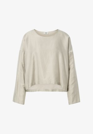 Beige langærmet crew neck-top med let croppet og løs pasform samt sænkede skuldre, lavet af en glat stof.