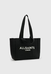 Fekete vászon bevásárlótáska kontrasztos fehér "ALLSAINTS LONDON" felirattal. Két strapabíró vállpánttal és struktúrált designnal rendelkezik.