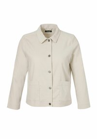 Crèmekleurige corduroy jas met vijf metalen knopen, twee voorzakken, lange mouwen en een puntige kraag.