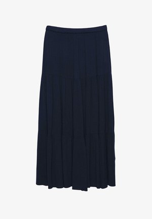 Jupe longue bleu marine foncé à volants, avec une taille froncée et de doux plis créant une silhouette fluide.
