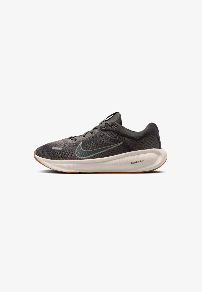 Black mesh running shoe with a white midsole, grey accents, and a gum rubber outsole. Features a rounded toe and lace-up design.