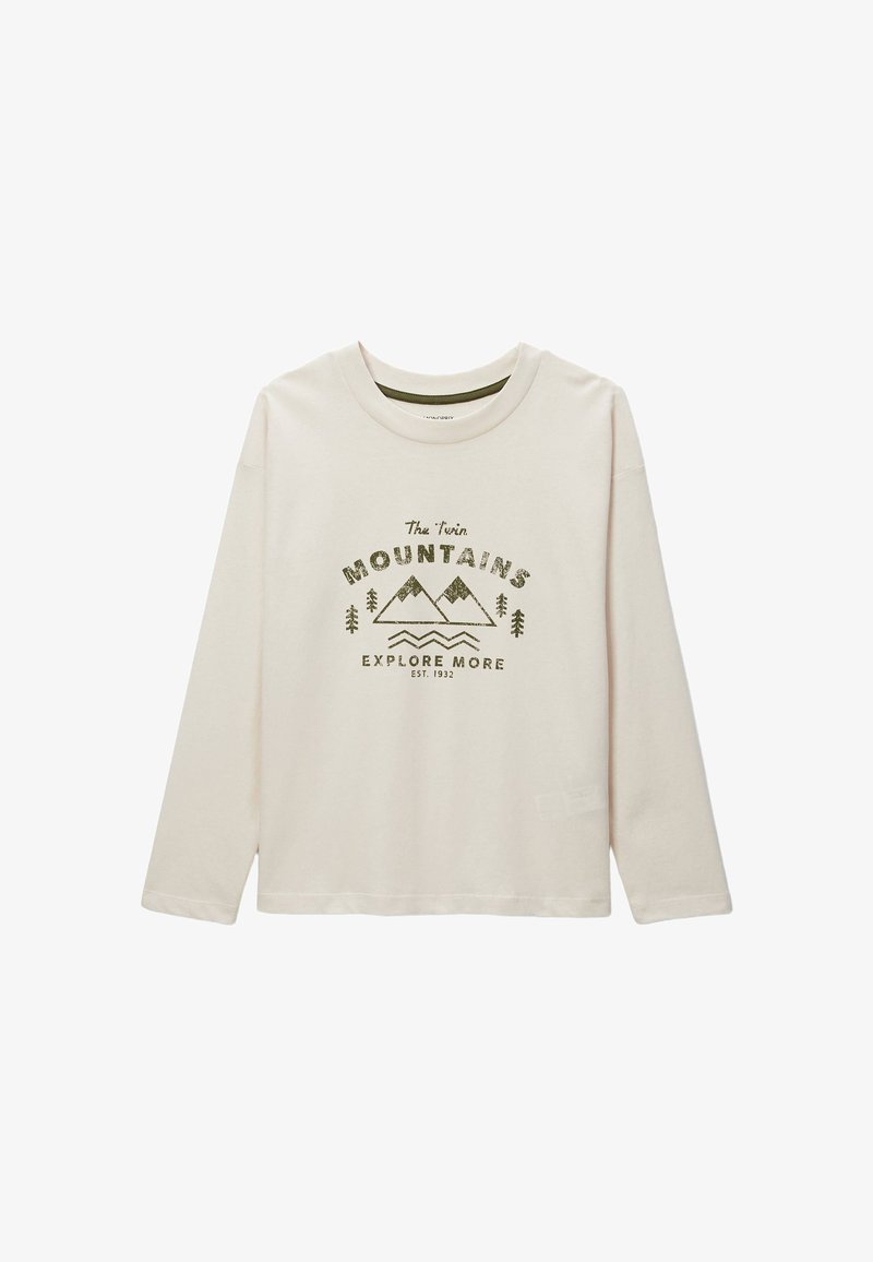 T-shirt à manches longues beige clair en coton, présentant un graphique de montagnes vertes et le texte "Les Montagnes Jumelles, Explorez Plus."
