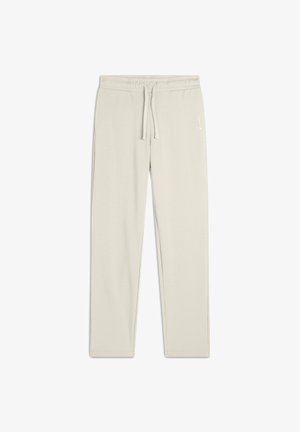 Pantalones de chándal gris claro fabricados en una suave mezcla de algodón. Cuentan con una cintura elástica con cordón y bolsillos laterales. Textura suave.